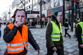 TreiberInnen mit Pröll-Masken