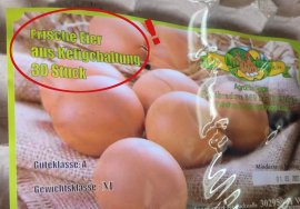 Ei-Etikett mit großem Käfigei-Hinweis